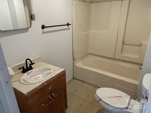 full bathroom with shower / bathing tub combination, toilet, vanity, and tile patterned floors