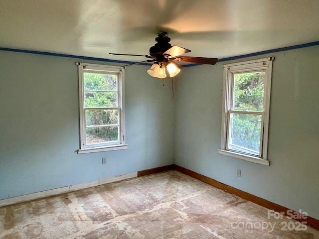 spare room with ceiling fan