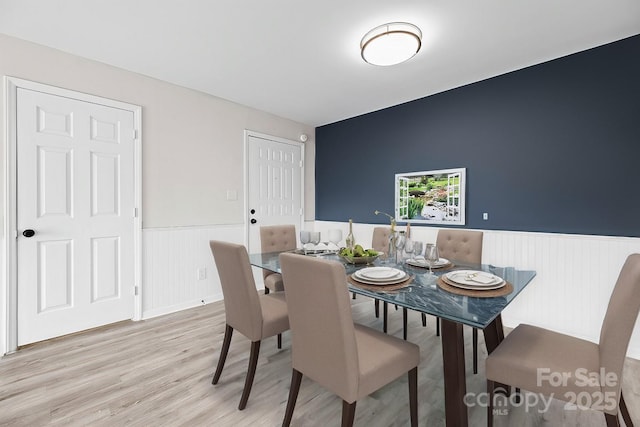 dining room featuring light hardwood / wood-style flooring