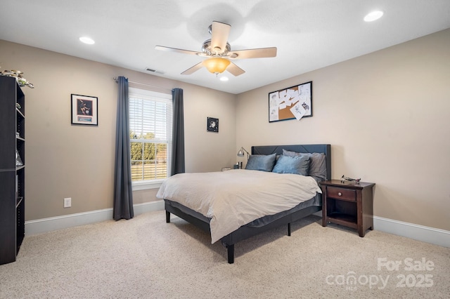 carpeted bedroom with ceiling fan