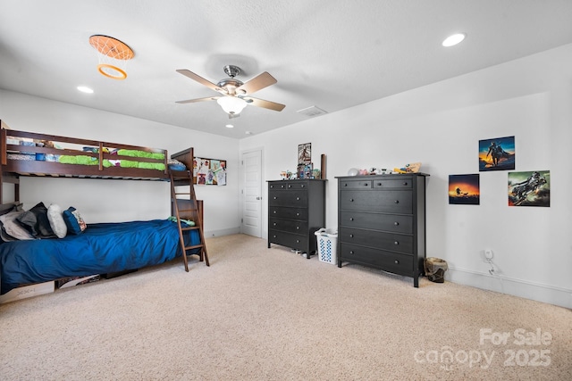 carpeted bedroom featuring ceiling fan