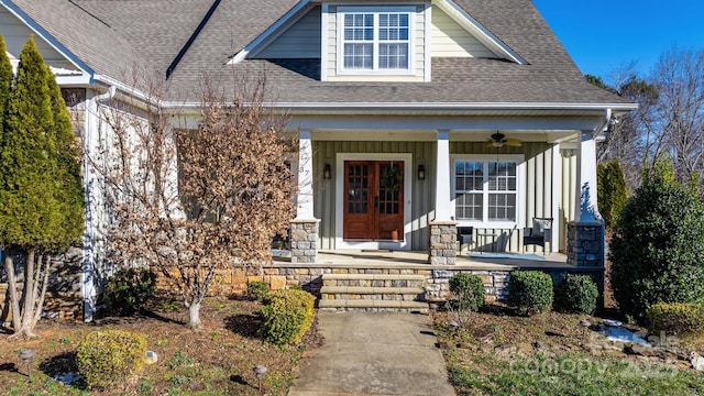 view of exterior entry with a porch