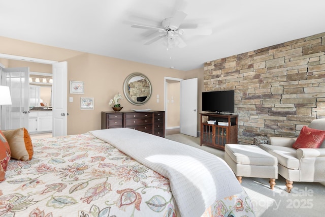 bedroom with ceiling fan and ensuite bathroom