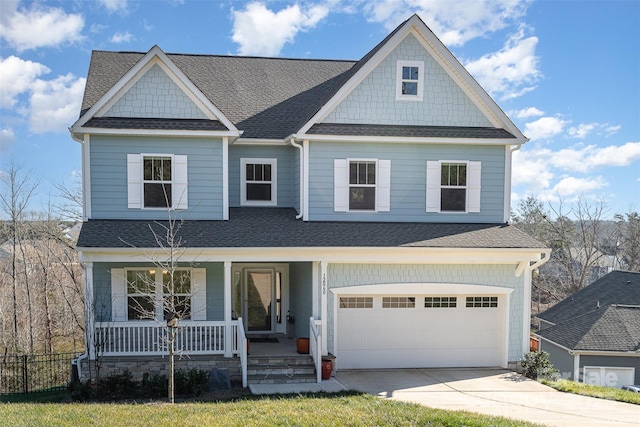 craftsman-style house with a garage and covered porch