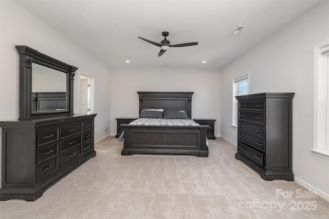 carpeted bedroom with ceiling fan