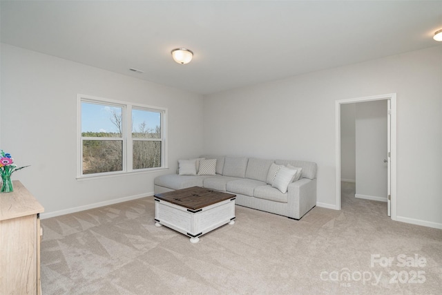 living room featuring light carpet