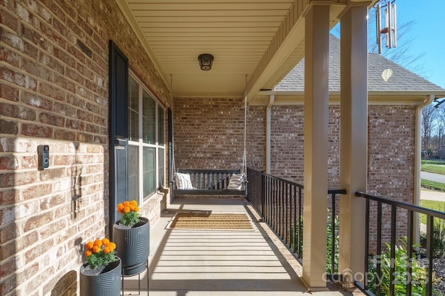 balcony featuring covered porch