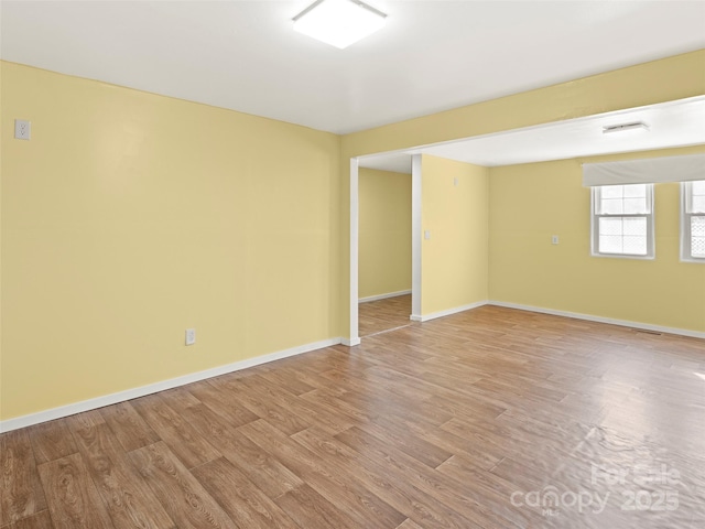 empty room featuring light hardwood / wood-style floors