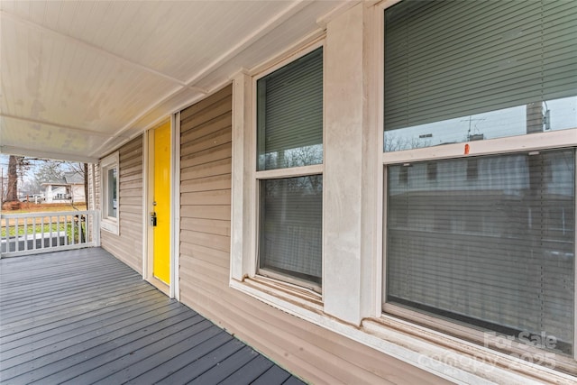 wooden deck featuring a porch