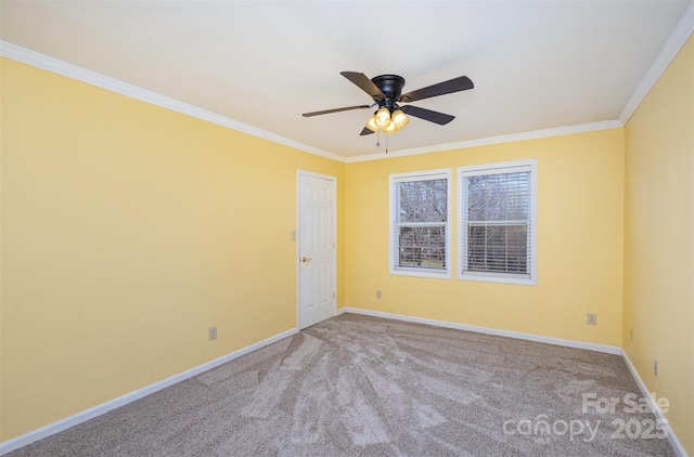 empty room featuring light carpet, ornamental molding, and ceiling fan