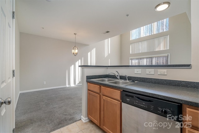 kitchen with light carpet, pendant lighting, dishwasher, and sink