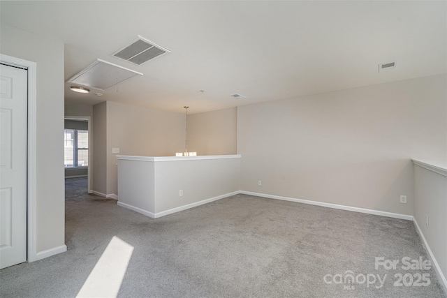 empty room with light colored carpet