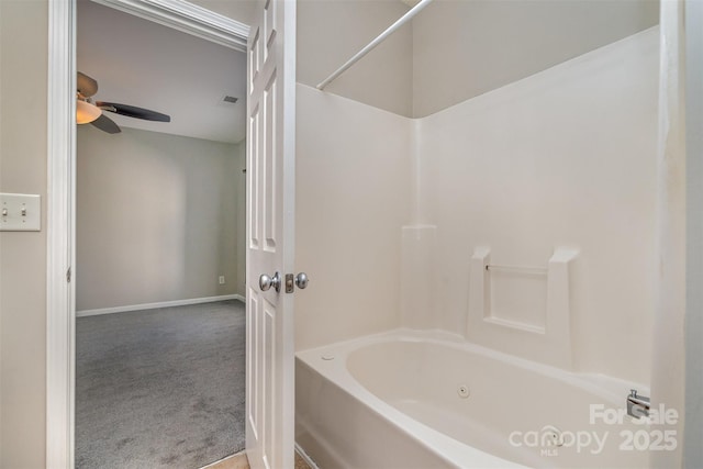 bathroom with shower / tub combination and ceiling fan