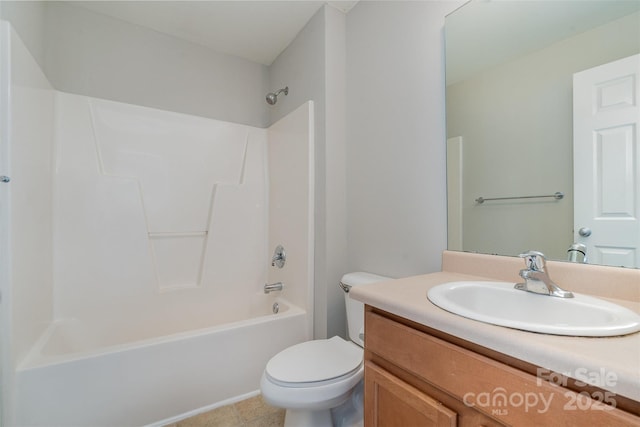 full bathroom featuring tile patterned floors, toilet, vanity, and shower / washtub combination