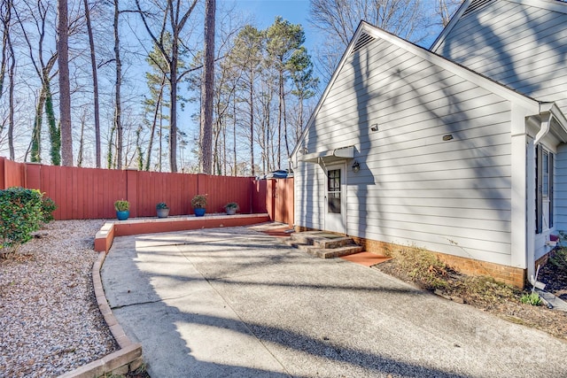 view of property exterior featuring a patio area