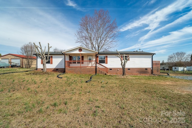 view of front of home featuring crawl space, a porch, and a front yard