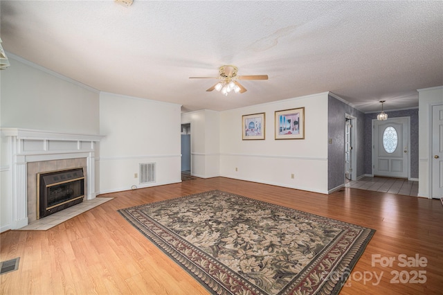 110 Robin Rd, Lincolnton, NC 28092 - living area featuring wood finished floors, a ceiling fan, visible vents, and a textured ceiling