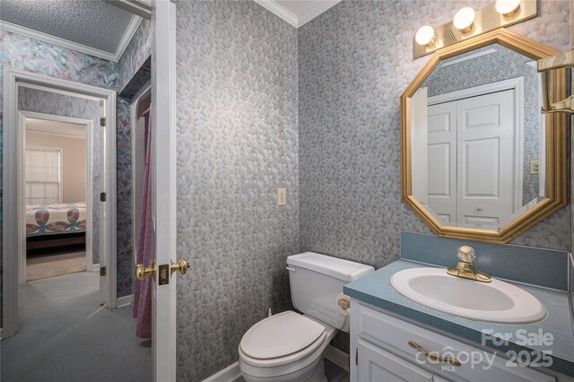 110 Robin Rd, Lincolnton, NC 28092 - bathroom with a textured ceiling, toilet, ornamental molding, and wallpapered walls