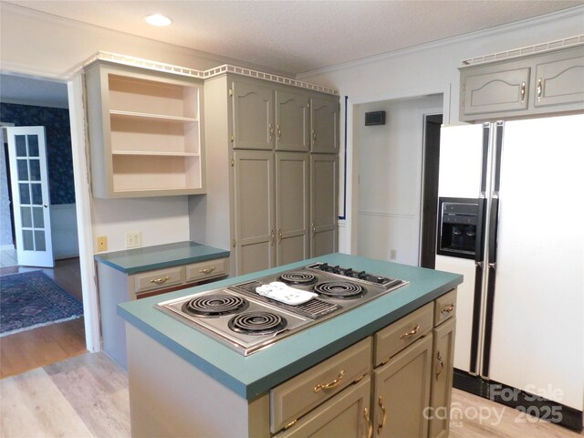 110 Robin Rd, Lincolnton, NC 28092 - kitchen featuring light wood-style flooring, open shelves, a kitchen island, stainless steel electric stovetop, and white fridge with ice dispenser