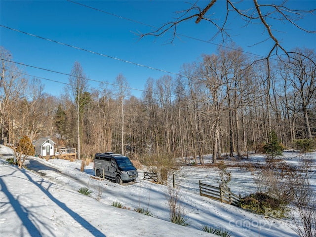 view of yard layered in snow