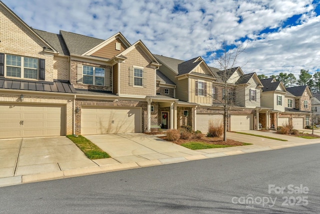 townhome / multi-family property featuring a garage