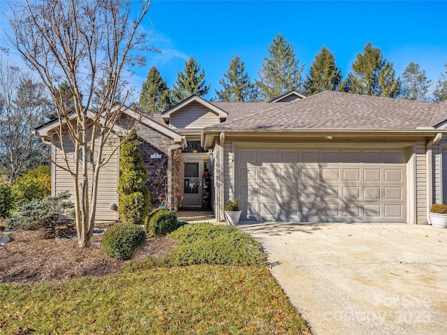 single story home with a garage