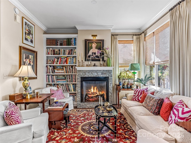 sitting room with crown molding and a fireplace