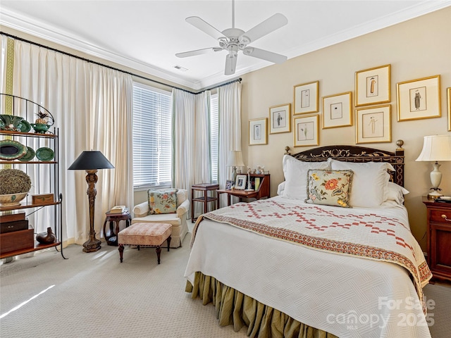 bedroom featuring ceiling fan, carpet flooring, and crown molding