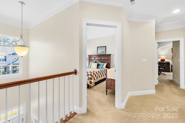 hall featuring light carpet and ornamental molding