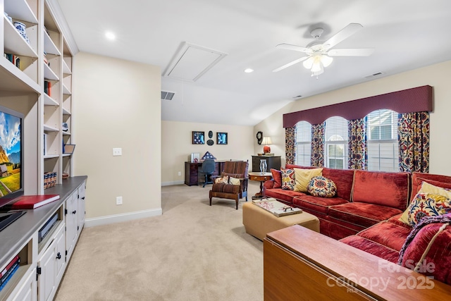 living room featuring vaulted ceiling, ceiling fan, and light carpet