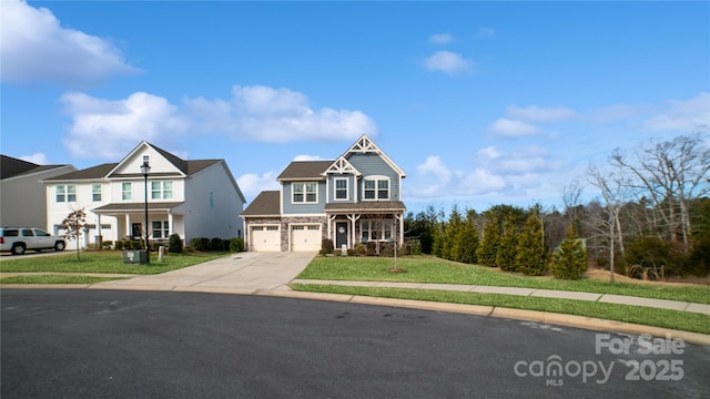 view of front of home featuring a porch, a garage, and a front yard