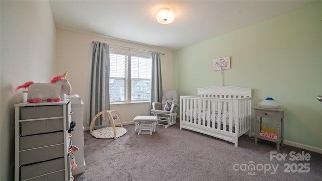 carpeted bedroom with a nursery area