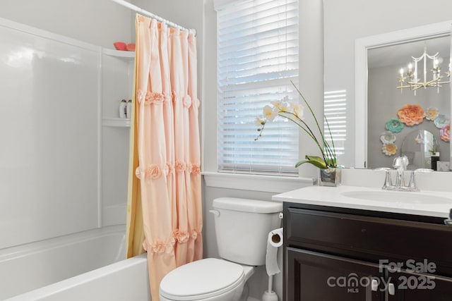 full bath featuring toilet, shower / bath combination with curtain, and vanity