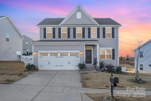 view of property with a garage