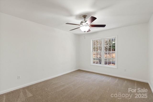 unfurnished room featuring carpet floors and ceiling fan