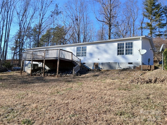 rear view of property with a deck