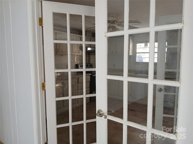 details featuring ceiling fan and french doors