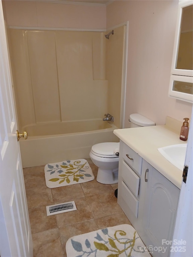 full bathroom with vanity, tub / shower combination, tile patterned floors, and toilet