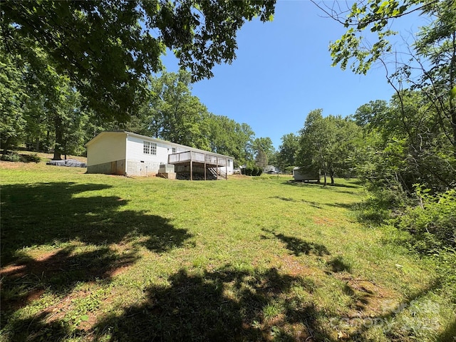 311 Coopers Gap Rd, Rutherfordton, NC 28139 - view of green lawn with a wooden deck and stairway