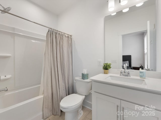 full bathroom featuring shower / tub combo with curtain, vanity, and toilet