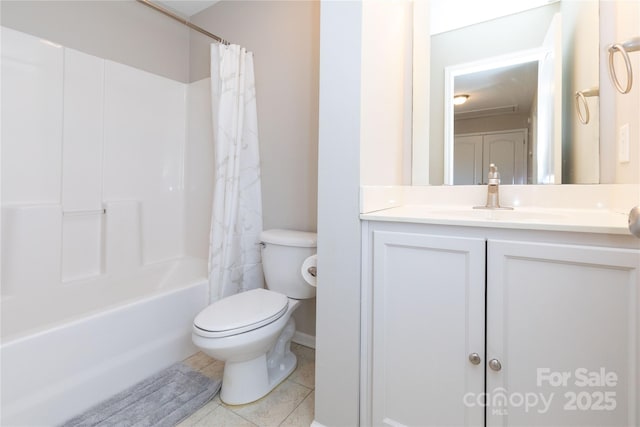 full bathroom with toilet, tile patterned floors, vanity, and shower / bath combo with shower curtain