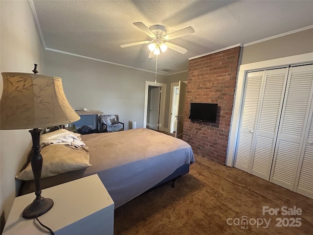 bedroom with ornamental molding and a textured ceiling