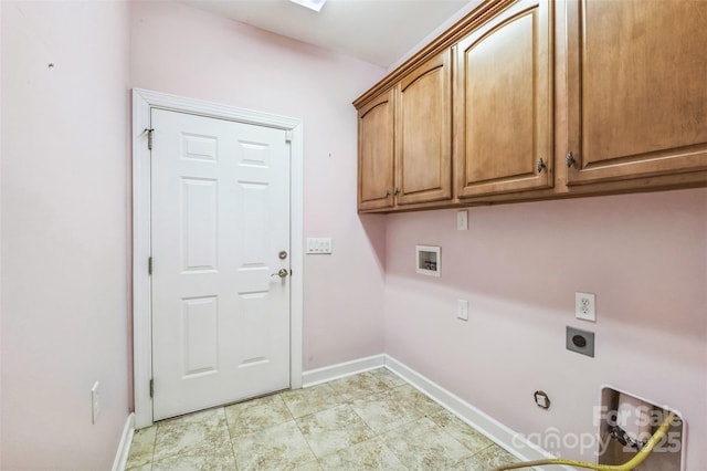 laundry area with cabinets, hookup for a washing machine, gas dryer hookup, and electric dryer hookup