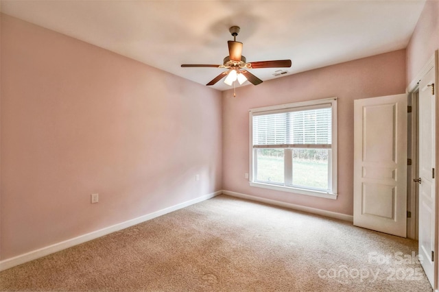 629 Cordova Ct, Salisbury, NC 28146 - empty room featuring light carpet, baseboards, and ceiling fan