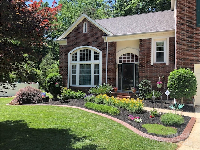 view of front of property with a front lawn