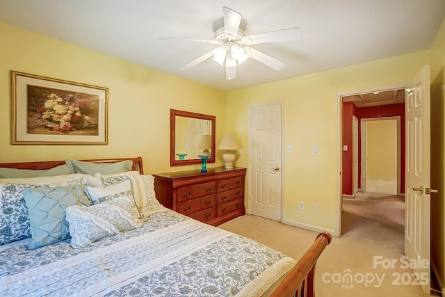 bedroom with light colored carpet and ceiling fan