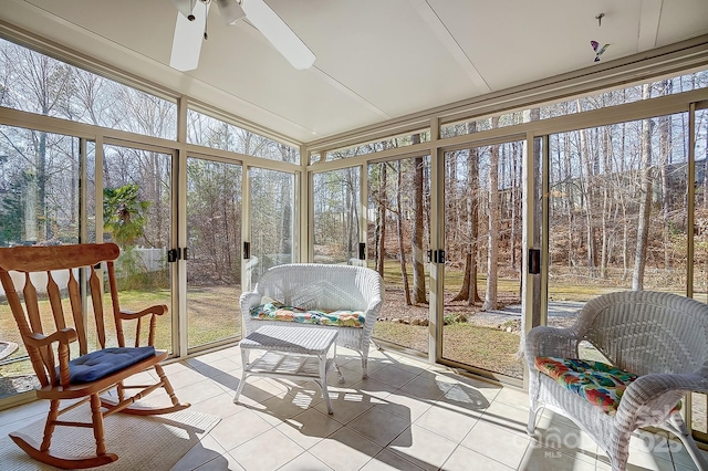 sunroom / solarium with ceiling fan