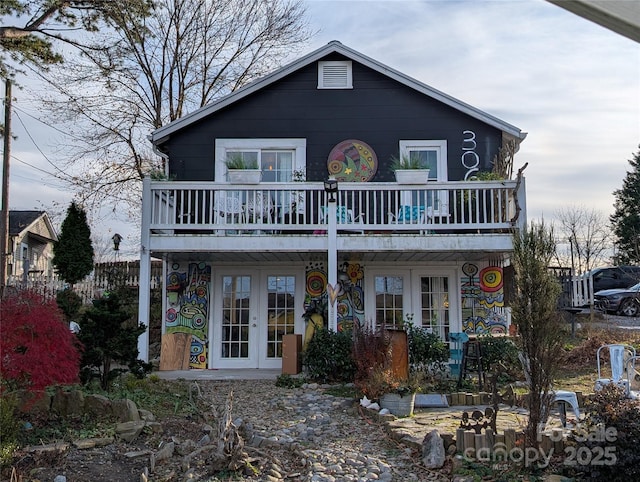 front facade featuring french doors