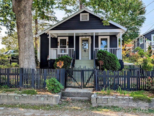 bungalow-style home featuring covered porch