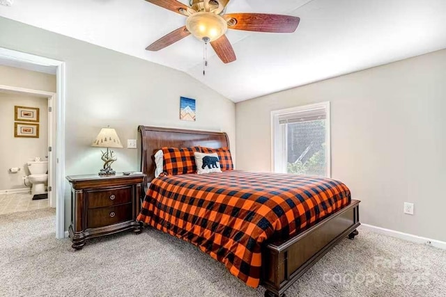 carpeted bedroom featuring vaulted ceiling and ceiling fan